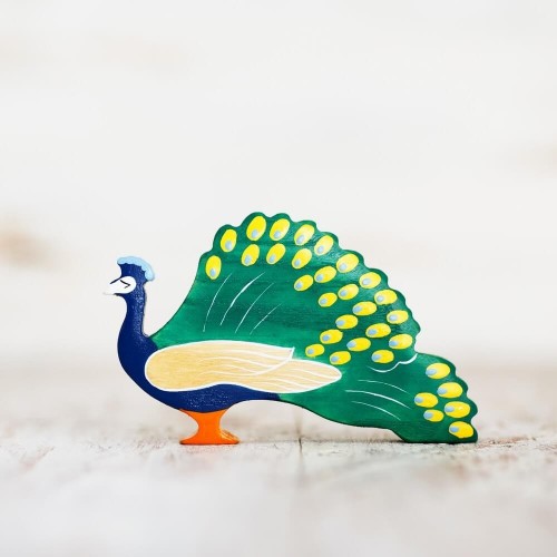 Toy peacock figurine