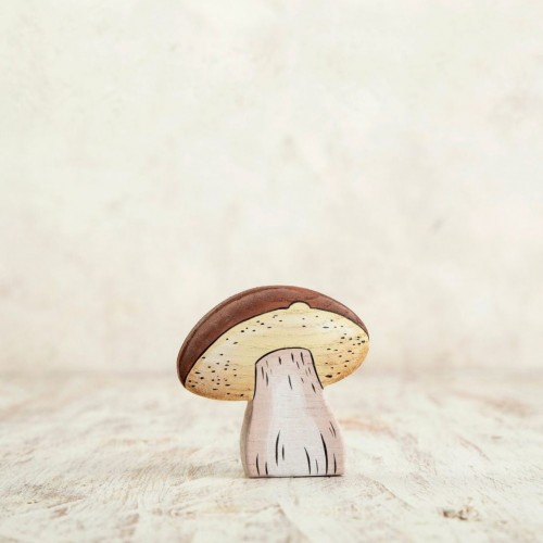 Wooden mushroom with a brown cap